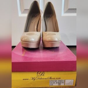 Nudes patent leather heels